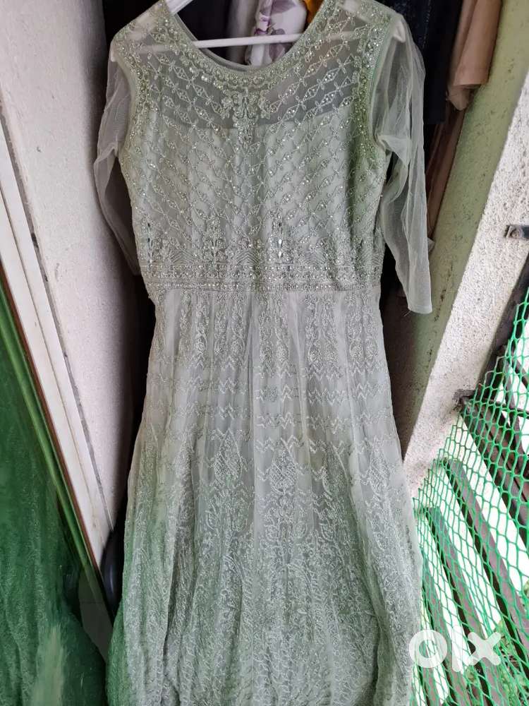 Pastel green full gown with pearl work