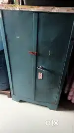 Bed and fridge and almari