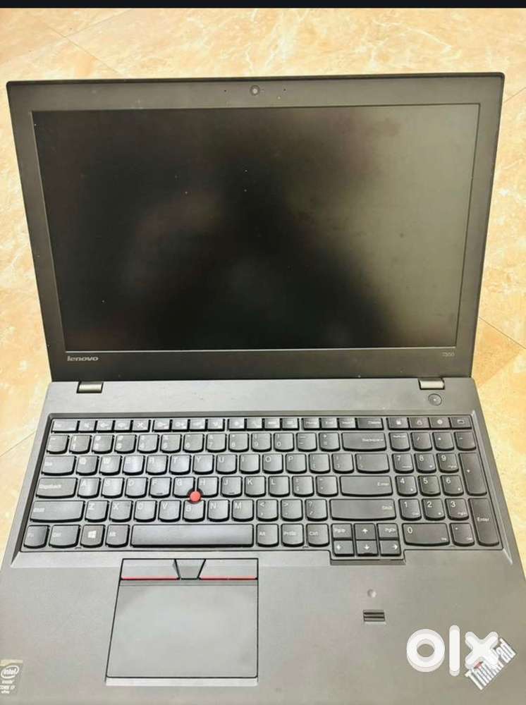 A business laptop in new condition with charger