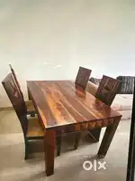 6 seater dinning table , it is of pure wood , very good condition