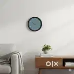 trendy wall clock -almost new