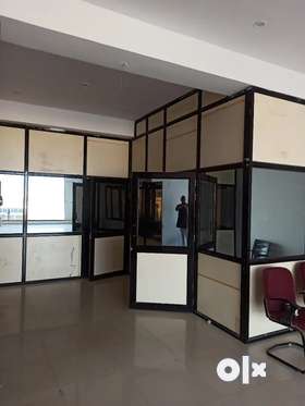 Aluminium partition available in coffee colour with 5 mm glass. With two aluminium doors