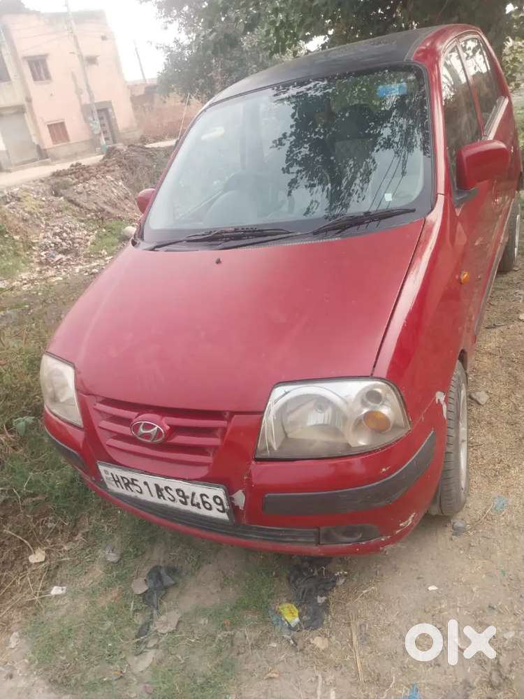 I m selling my santro car.red colour alloy wheel full insurence center