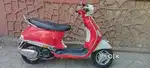 VESPA VXL RED & WHITE IN GOOD CONDITION