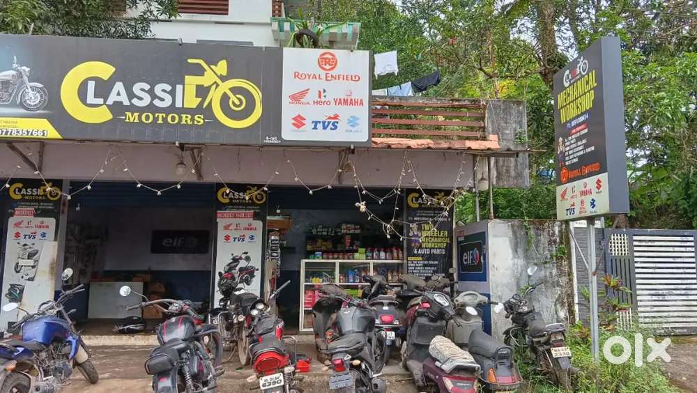 Two Wheeler Spare Parts Shop With Two Wheeler workshop