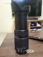 Canon 55-250mm telephoto lens with hood in excellent condition