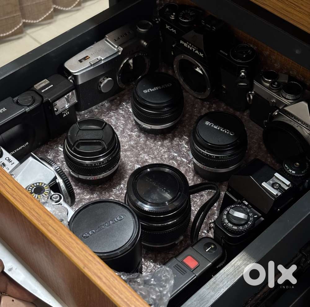 Multiple ZUIKO lenses 24mm, 28mm, 55mm, 135mm, 600mm