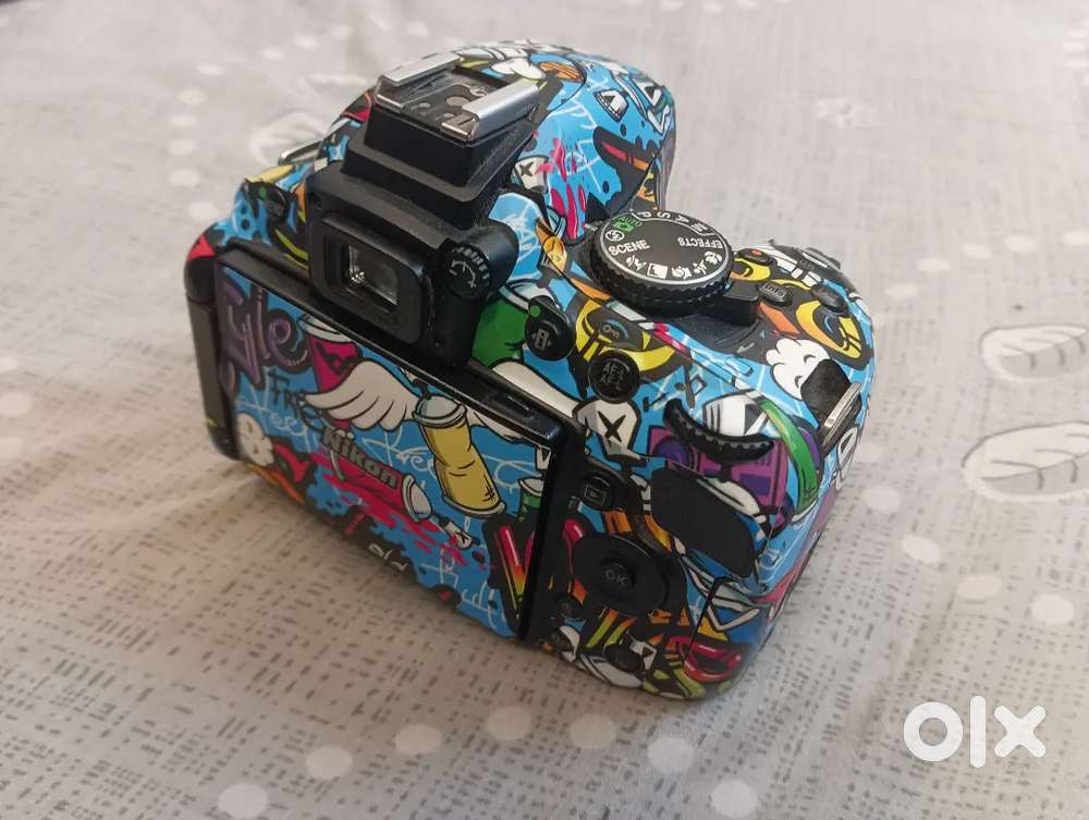 Nikon D5100 with 2 lenses... 18-55 and 55-300 telephoto lens