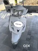 Tvs jupiter white colour