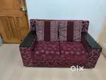 2 seater sofa with pillows