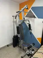 Home gym machine with bench , weights and rodes