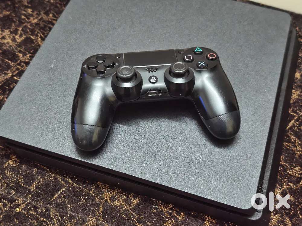 PS4 Slim 1TB good condition with original sony controller