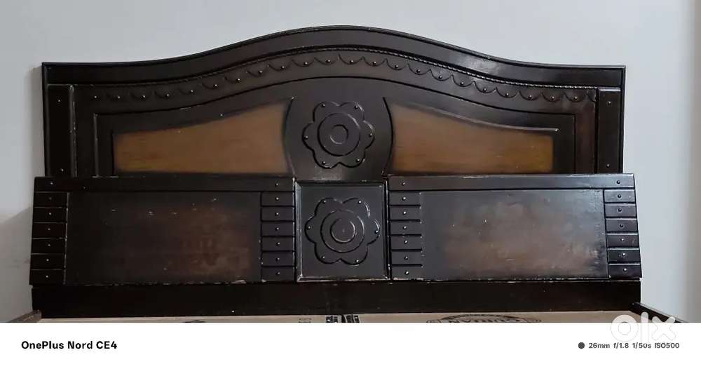 A double bed with head board for keeping things it is a beds offer