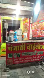 Navlkha buscando main road ki shop h 2 shutter h front me main road