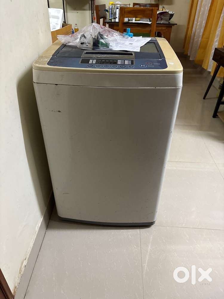 LG WASHING MACHINE TOP LOAD