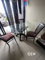 Round glass dining table
