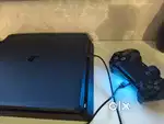 PS4 Slim 1 TB 12.02