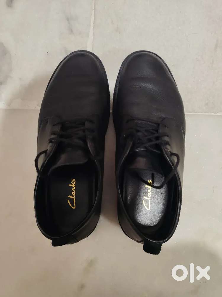 Clarks black leather casual shoes.