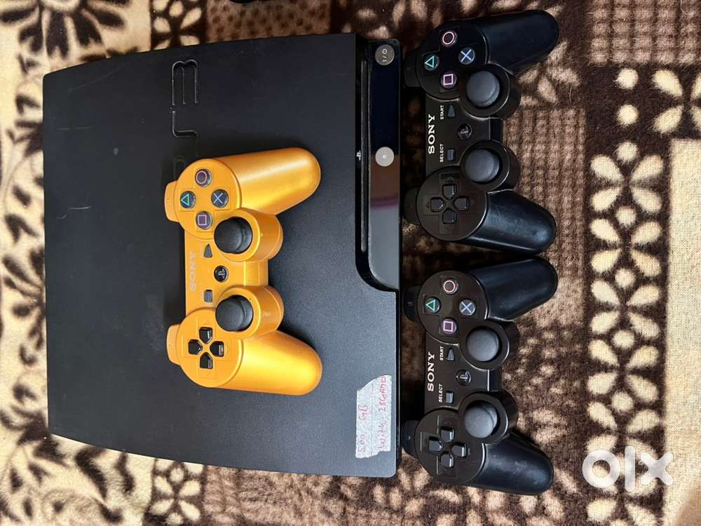 Ps3 with 3 controllers and more than 20 games