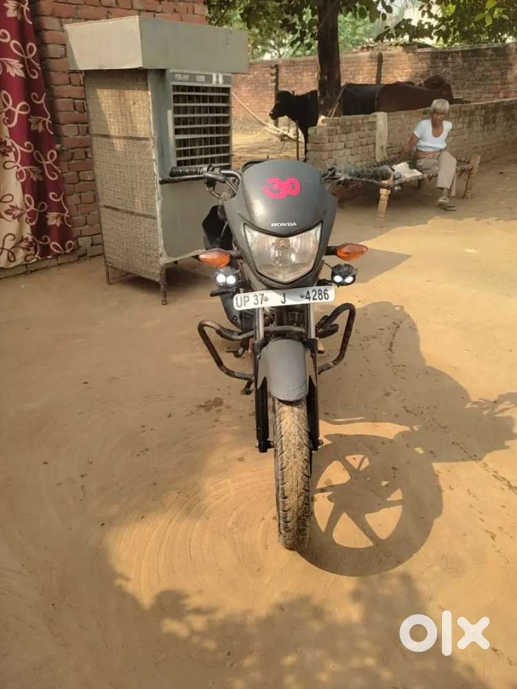 Back tyre new ceat or front tyre 70%, first owner, service done,