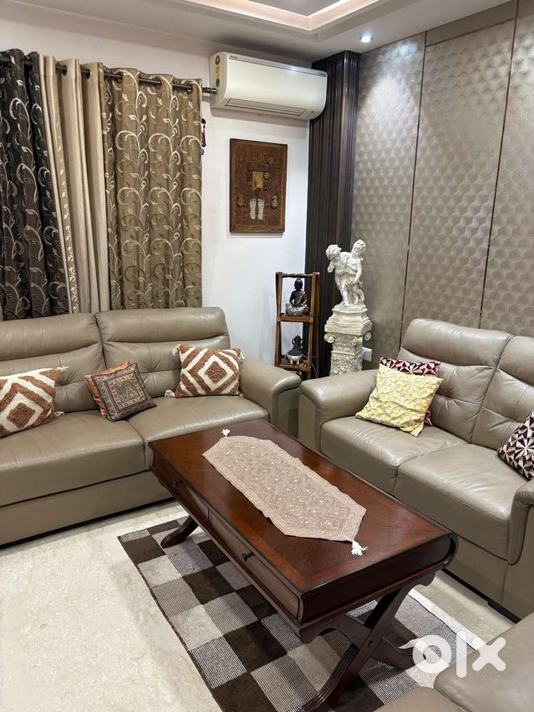 Modern Designer Sofa Set with Stylish Central Table