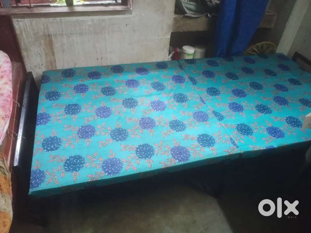 Single folding bed with mattress