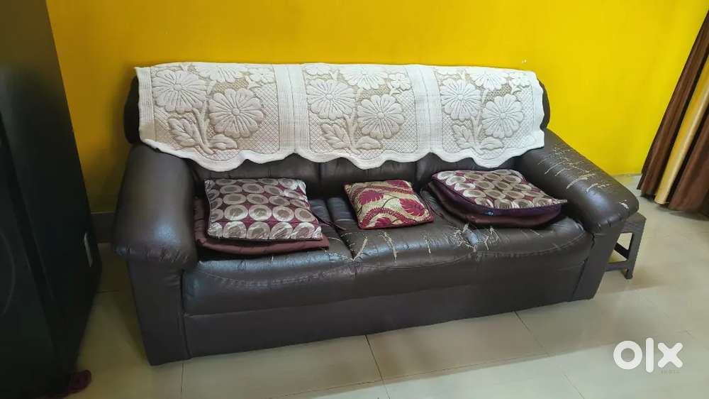 Three seater sofa with cushions