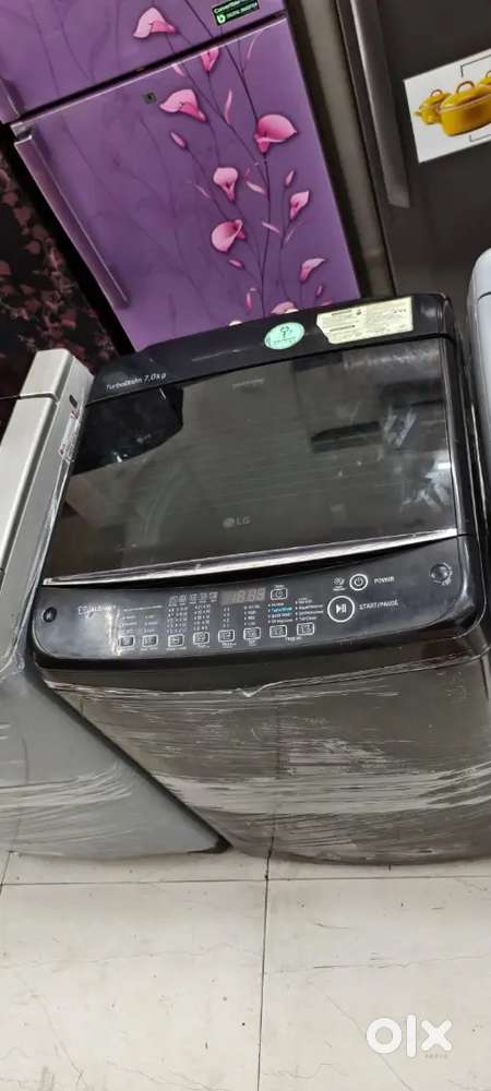 LG washing machine fully automatic top load with warranty 1 year old