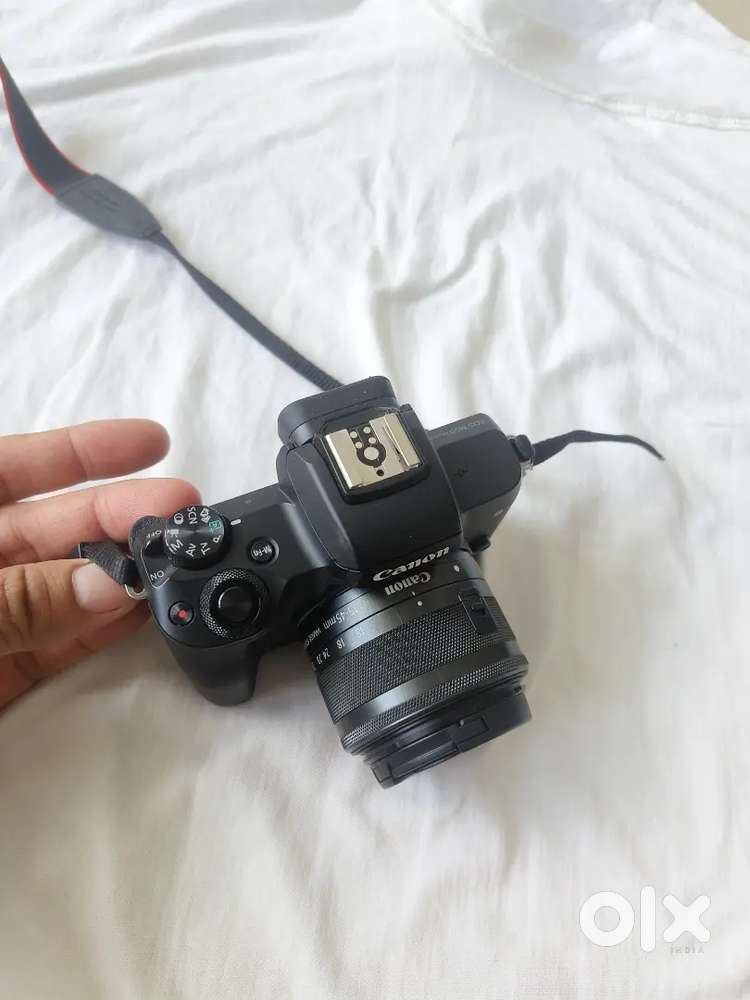 Canon m50 mark 2 with flash ,55-250 lens ,adapter ,extra battery etc