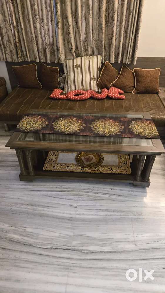 A movable pure Sagwan wood center table of 4.25 ft × 2.3 ft x 1.6 ft