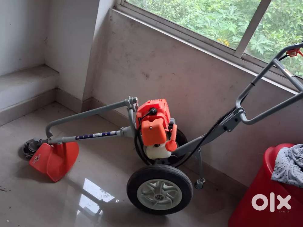 Woodpecker 2 stroke grass cutting machine