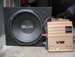 JBL woofer and Bossman amplifier combo.