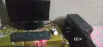 Desktop computer including monitor, mouse, speaker and cpu.