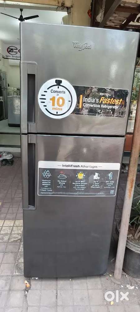 Whirlpool double door fridge good condition with warranty 1 year old