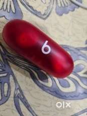 Beats solo buds ( transparent red)