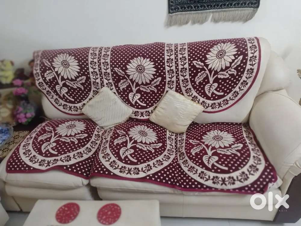 2x 4 seater sofa sets, flush leather and antique wooden for sale.