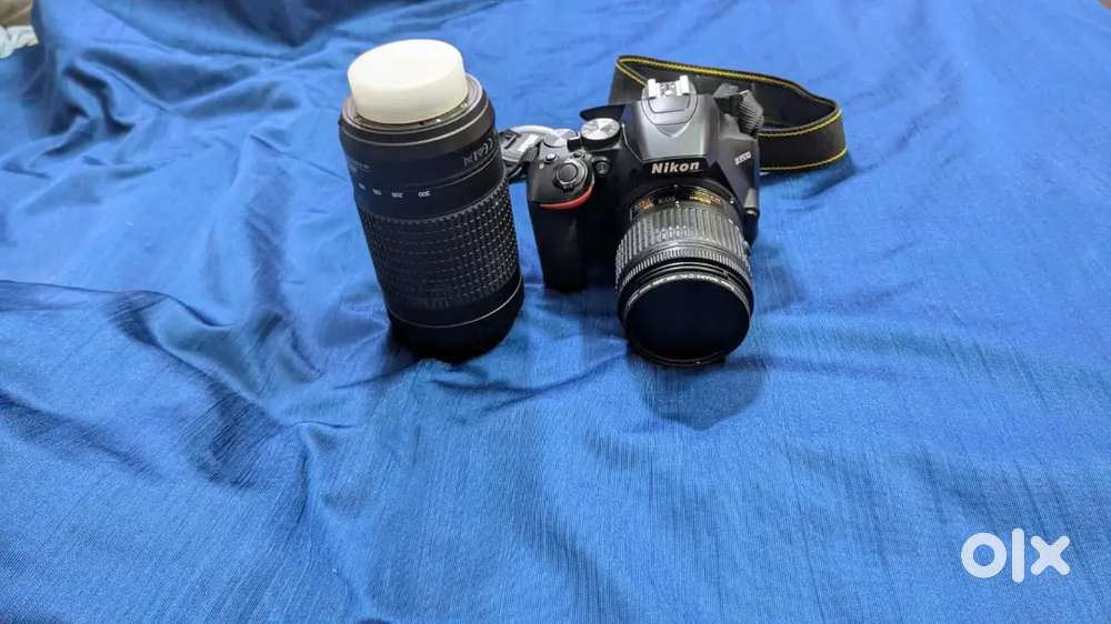 Nikon D3500  - Dual Lens, Extra Battery & polarizer . No Complaints.