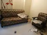 Wooden five seater cushioned sofa