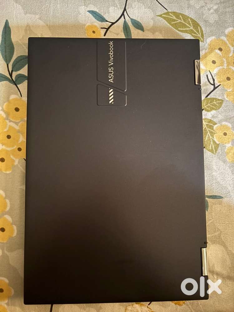 Asus Go Flip Vivobook 14 laptop with Touchscreen and tablet