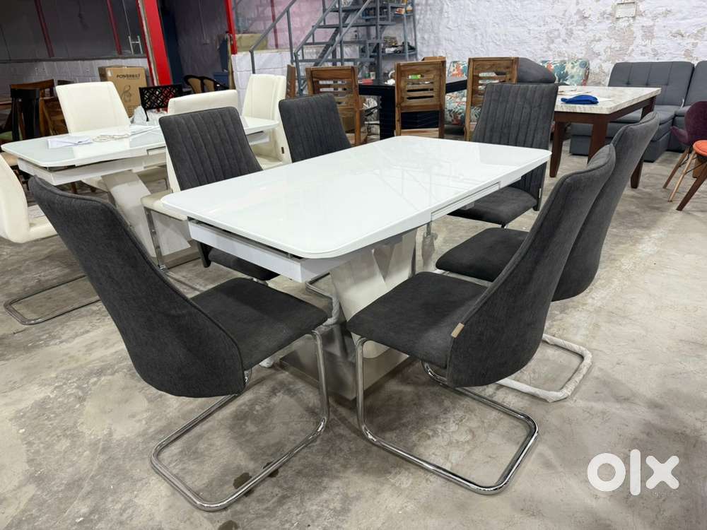 URBAN LADDER ; Caribu 4-6 Dining+6 ingrid chairs for Upto 70% Off Sale