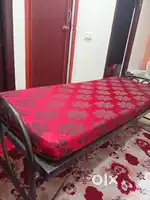 Single folding bed with mattress