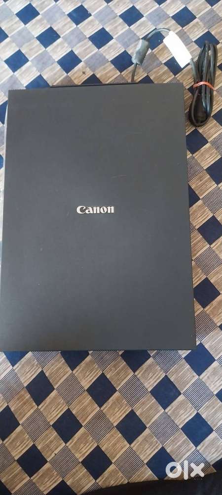 The scanner brand is cannon the scanner name is Canoscan LiDE 300