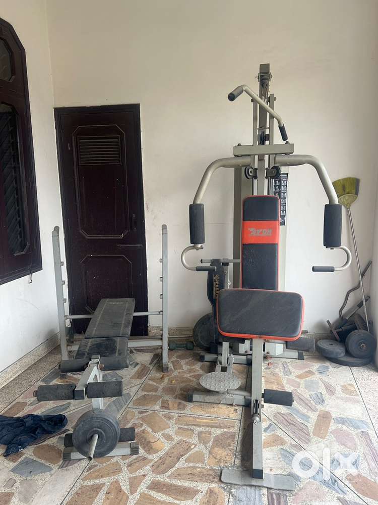 Multi gym machine, dumbells, plates, bench