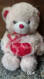 Toys. Teddy bear and embroidery bag