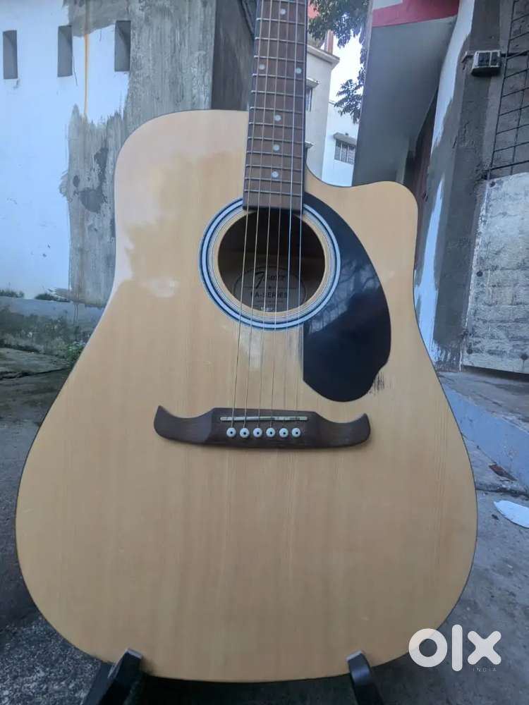 Acoustic guitar with pickup ( Fender FA125CE )