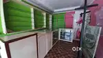 TEXTILE SHOP COUNTER AND GLASSES