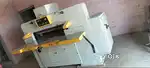 Cutting edge squaring and stitching machine