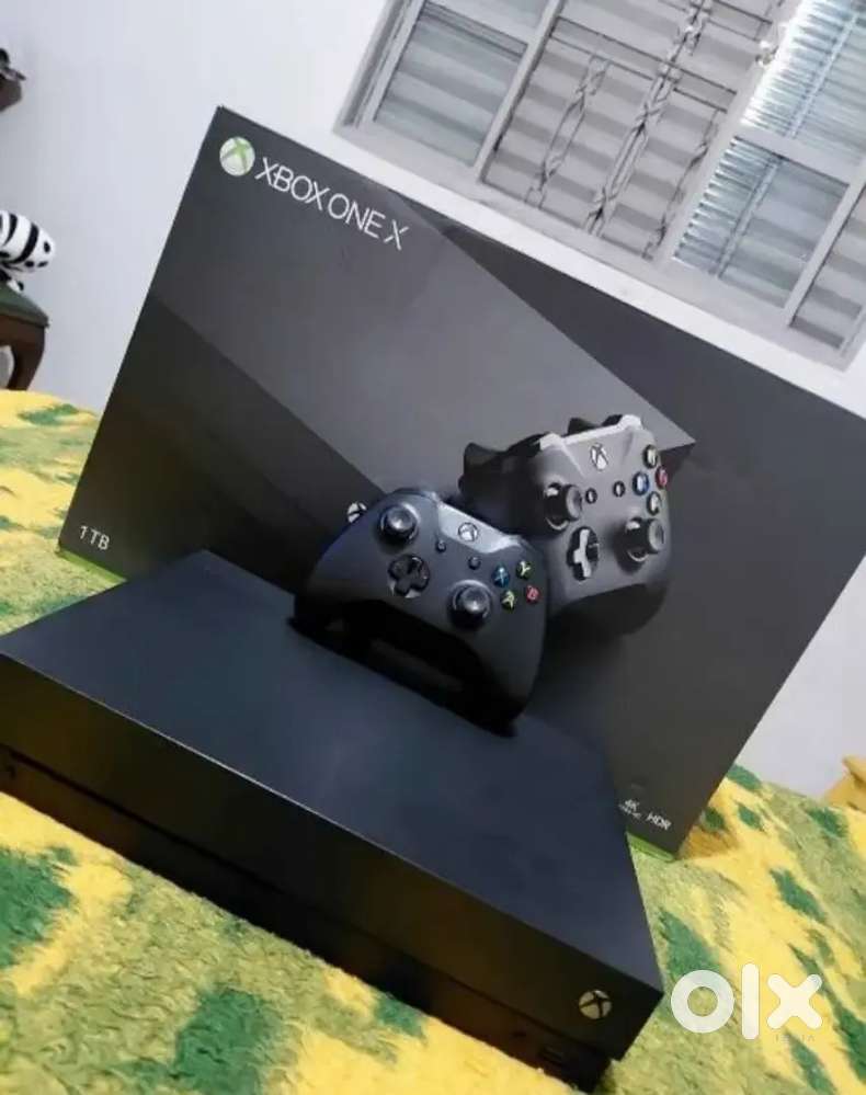 XBOX ONE X  1TB Flawless Condition  With 18+ Games Single Controller