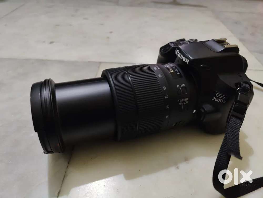 Canon 200D with 18/135 lens +Sunpak Flash Light