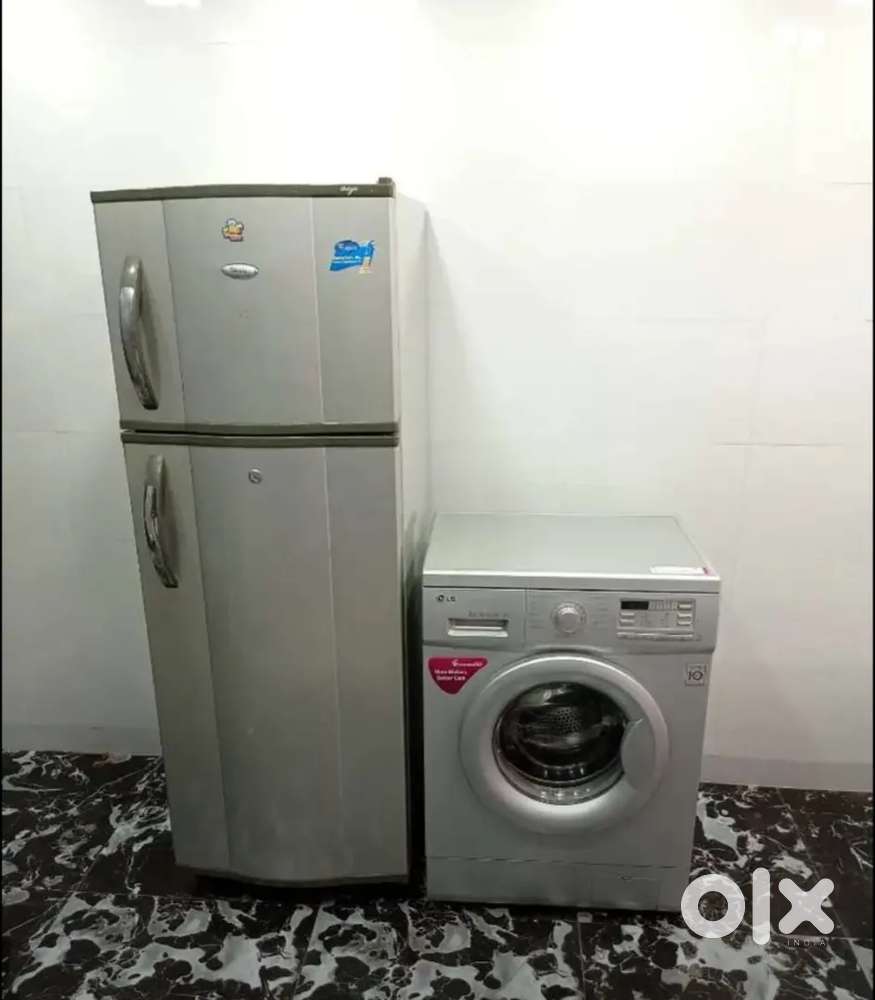 Double door silver colour refrigerator with grey colour front load